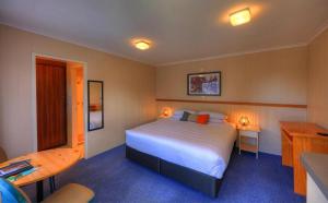 Ένα ή περισσότερα κρεβάτια σε δωμάτιο στο Best Western Burnie - Murchison Lodge