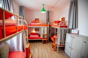 Postel nebo postele na pokoji v ubytování SUM Guesthouse Jeju Airport