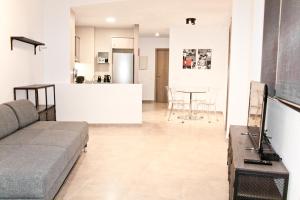 Кът за сядане в Urban Manesa city center apartment with private patio