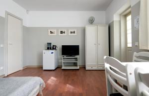 TV a/nebo společenská místnost v ubytování Promenaadi Villa