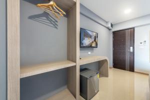 TV a/nebo společenská místnost v ubytování PLAAI Play Hotel