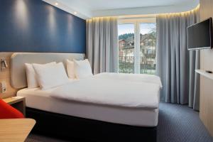 Postel nebo postele na pokoji v ubytování Holiday Inn Express Baden-Baden by IHG
