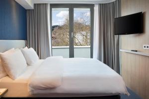 Postel nebo postele na pokoji v ubytování Holiday Inn Express Baden-Baden by IHG
