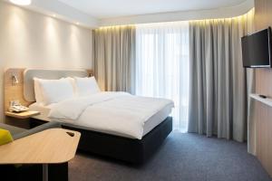 TV a/nebo společenská místnost v ubytování Holiday Inn Express Baden-Baden by IHG