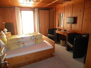 Ein Bett oder Betten in einem Zimmer der Unterkunft Alpenhaus Waldberg