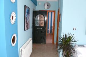 Televízia a/alebo spoločenská miestnosť v ubytovaní Pogonia Sea View Apartment