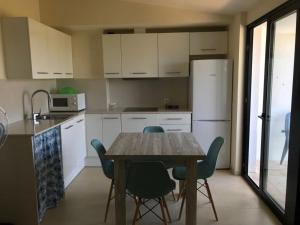 Кухня или кухненски бокс в Apartamento Sa Perdiu 16