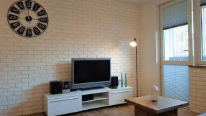 Televízia a/alebo spoločenská miestnosť v ubytovaní Krupówki i Styl, Krupówki Inn i Studio Miła w Centrum przy Krupówkach APARTZAKOP
