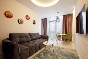 Et opholdsområde på R Panoramic sea view 1 BR luxury Arcadia apartament