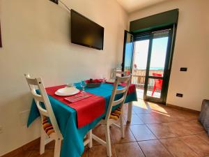 A television and/or entertainment centre at Residence Bellavista