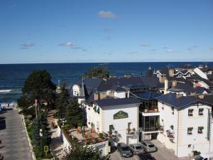 an aerial view of a town next to the ocean at Meduza Hotel & Spa in Mielno