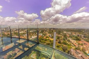 an aerial view of a city from a glass tower at Prime Living Luxury Apartments in Nairobi