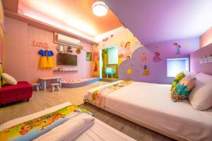 Postel nebo postele na pokoji v ubytování Han Tian B&B