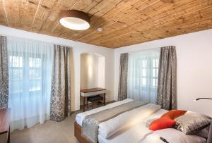 Letto o letti in una camera di Residence Hluboká
