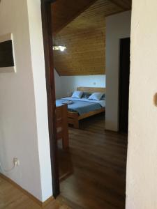 Postel nebo postele na pokoji v ubytování House Nada