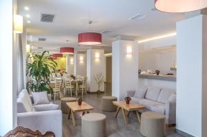 منطقة جلوس في Xenia Hotel
