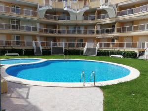 Bazén v ubytovaní Parquemar VIII Solo Familias Serviplaya alebo v jeho blízkosti