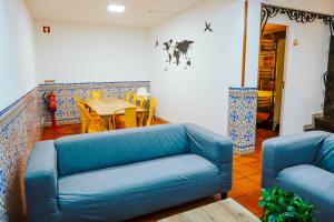 Uma área de estar em Help Yourself Hostels - Restelo