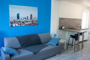 Posezení v ubytování Maisonnette avec jardin, parc du chêne (tram T5) + 3 fotografie