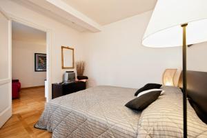 A bed or beds in a room at Romacentrarte