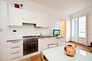 A kitchen or kitchenette at Romacentrarte