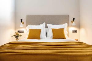 Posteľ alebo postele v izbe v ubytovaní Real Segovia Apartments by Recordis Hotels