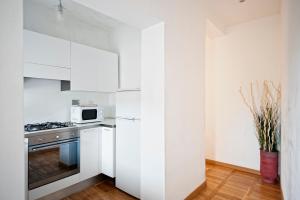 A kitchen or kitchenette at Romacentrarte