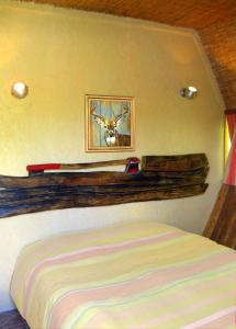 Postel nebo postele na pokoji v ubytování Chalets des Trois Hêtres
