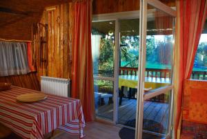 Postel nebo postele na pokoji v ubytování Chalets des Trois Hêtres