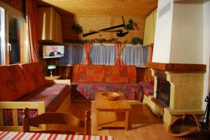 Posezení v ubytování Chalets des Trois Hêtres