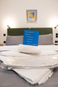 Postel nebo postele na pokoji v ubytování Anastazia Luxury Suites & Spa