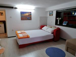 En eller flere senge i et værelse på Villa Davor