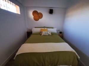 A bed or beds in a room at Lido Beachfront Még 37 kép