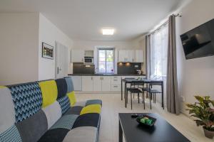Kuchyňa alebo kuchynka v ubytovaní Apartmány Malen