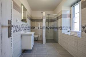 Kúpeľňa v ubytovaní Apartmány Malen