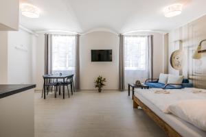 Posteľ alebo postele v izbe v ubytovaní Apartmány Malen