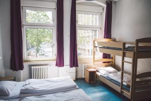 Postel nebo postele na pokoji v ubytování Happy Hotel Berlin