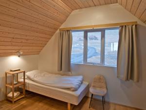 Postel nebo postele na pokoji v ubytování Skyrhusid HI Hostel