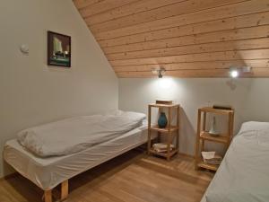 Postel nebo postele na pokoji v ubytování Skyrhusid HI Hostel + 24 fotografií