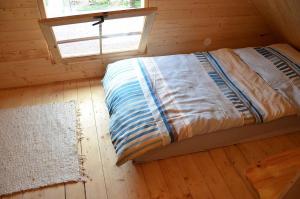 Postel nebo postele na pokoji v ubytování Chata U lomu