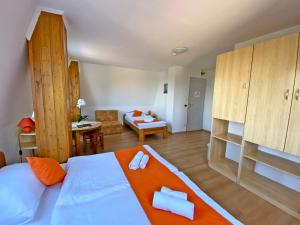 Postel nebo postele na pokoji v ubytování Hotel Magnólia