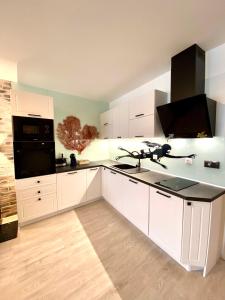 A kitchen or kitchenette at Sea View NewApartment-Bulgaria-Chernomorets