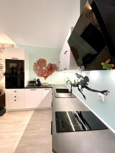 A kitchen or kitchenette at Sea View NewApartment-Bulgaria-Chernomorets