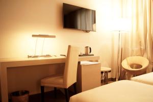 Postel nebo postele na pokoji v ubytování Best Western Plus Hotel Expo