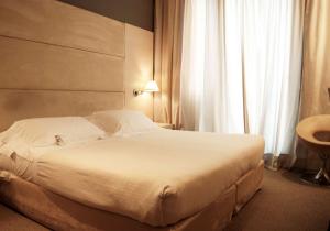Postel nebo postele na pokoji v ubytování Best Western Plus Hotel Expo