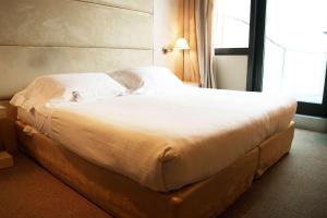 Postel nebo postele na pokoji v ubytování Best Western Plus Hotel Expo