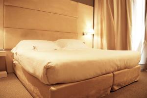 Postel nebo postele na pokoji v ubytování Best Western Plus Hotel Expo