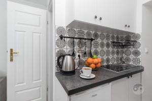 Kuchnia lub aneks kuchenny w obiekcie Goma Rent Długa Old Town Gdańsk