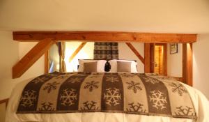 Letto o letti in una camera di Chalet Mavambo