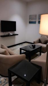Najran Hotel tesisinde bir televizyon ve/veya eğlence merkezi